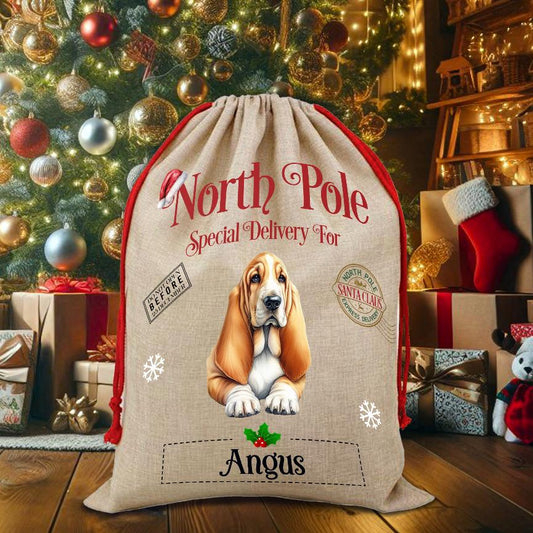 Personalised Dog Basset Hound – North Pole Special Delivery Santa Sack Pet Gift, by Floppsie Moppsie – floppsiemoppsie at floppsiemoppsie.co.uk