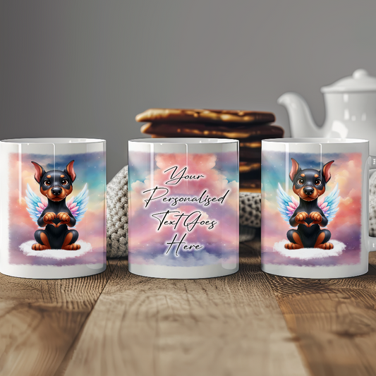 Personalised Dog Memorial Mug of Doberman with wings in clouds making a heart sign - Keepsake Gift Mug, by Floppsie Moppsie – floppsiemoppsie at floppsiemoppsie.co.uk