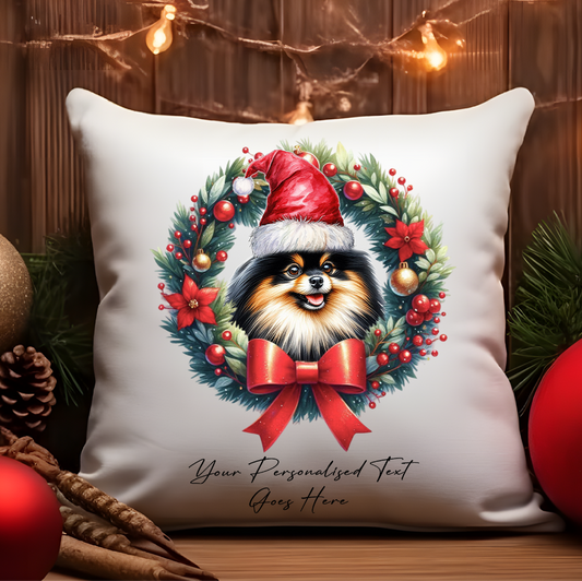 Personalised Black and Tan Pomeranian with Santa Hat in a Christmas wreath - Keepsake Gift cushion, by Floppsie Moppsie – floppsiemoppsie at floppsiemoppsie.co.uk