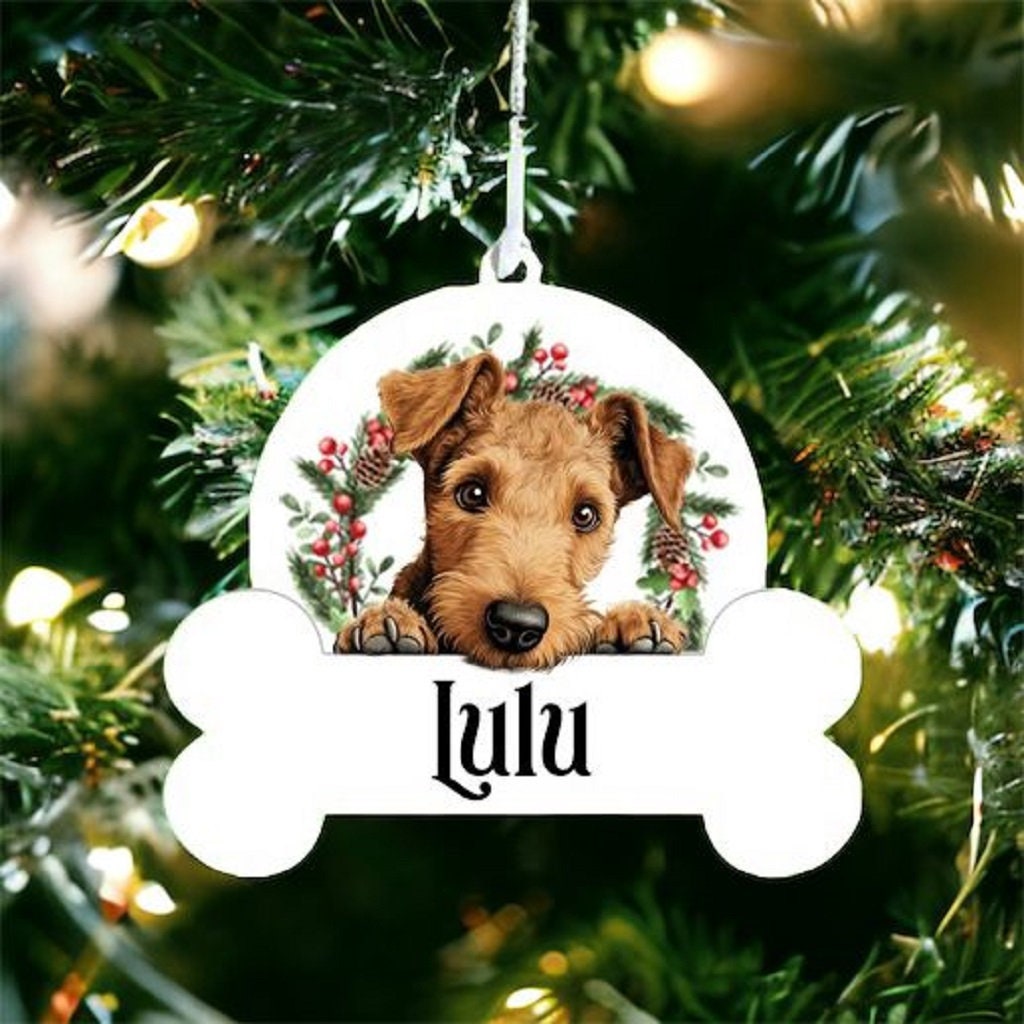 Personalised Christmas Bauble with Lakeland Terrier sat in a wreath