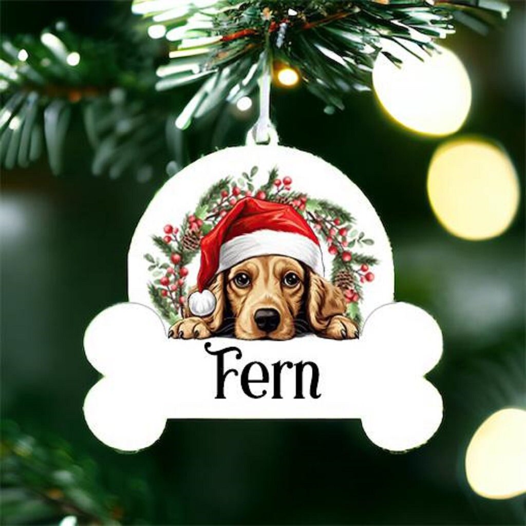 Personalised Christmas Bauble with Cocker Spaniel sat in a wreath