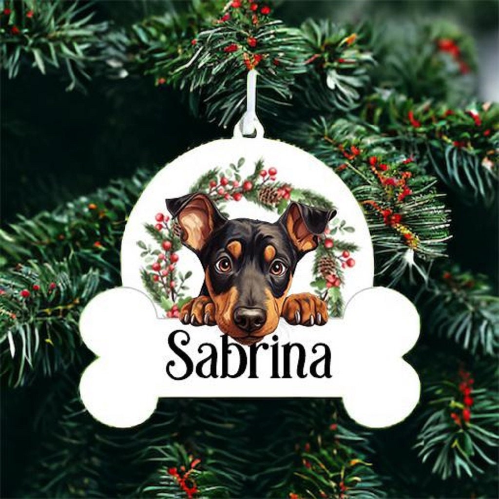 Personalised Christmas Bauble with Doberman Pinscher sat in a wreath