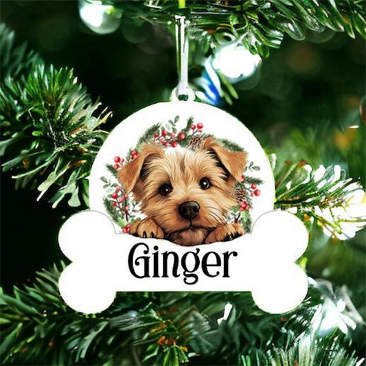 Personalised Christmas Bauble with Norfolk Terrier sat in a wreath