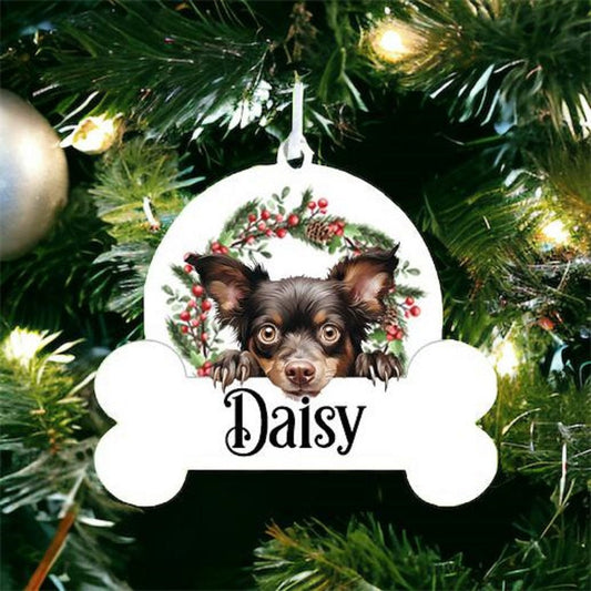 Personalised Christmas Bauble with Mudi sat in a wreath