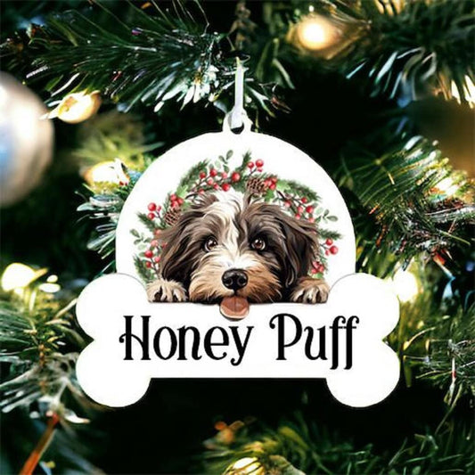 Personalised Christmas Bauble with Tibetan Terrier sat in a wreath