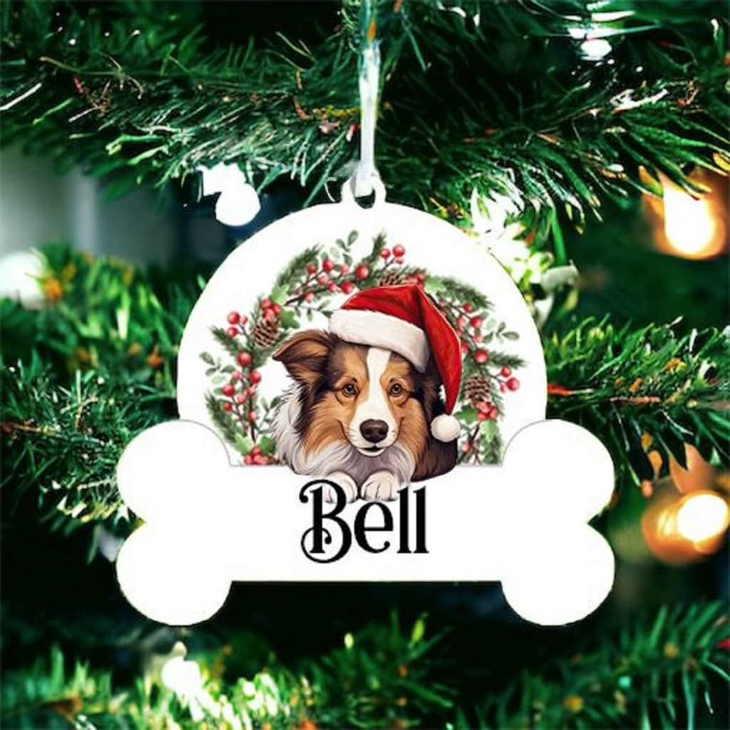 Personalised Christmas Bauble with Shetland Sheepdog sat in a wreath