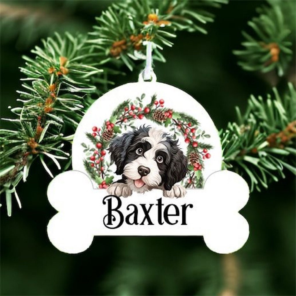 Personalised Christmas Bauble with Portuguese Water sat in a wreath