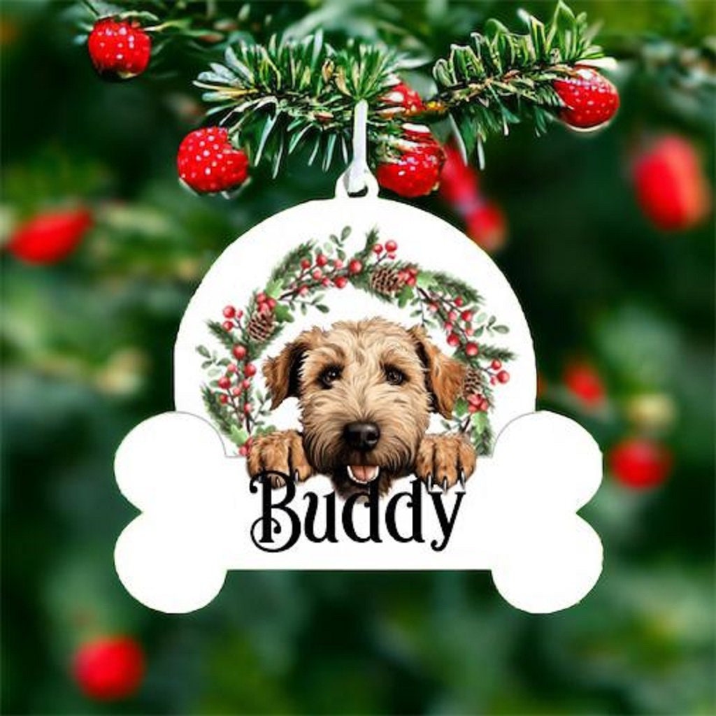 Personalised Christmas Bauble with Soft Coated Wheaten Terrier sat in a wreath