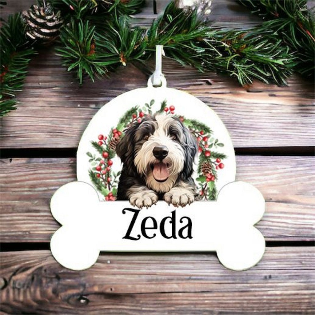 Personalised Christmas Bauble with Old English Sheepdog sat in a wreath