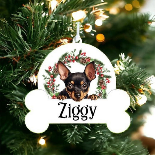 Personalised Christmas Bauble with Miniature Pinscher sat in a wreath